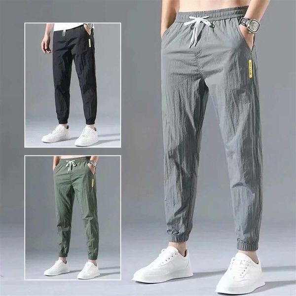 Herrenhosen Sommer Herren Casual Sports Hosen Polyester koreanische Herren Knöchel Krawatte Jogginghose Atmungsfreie Farbe Casual Pantl2403