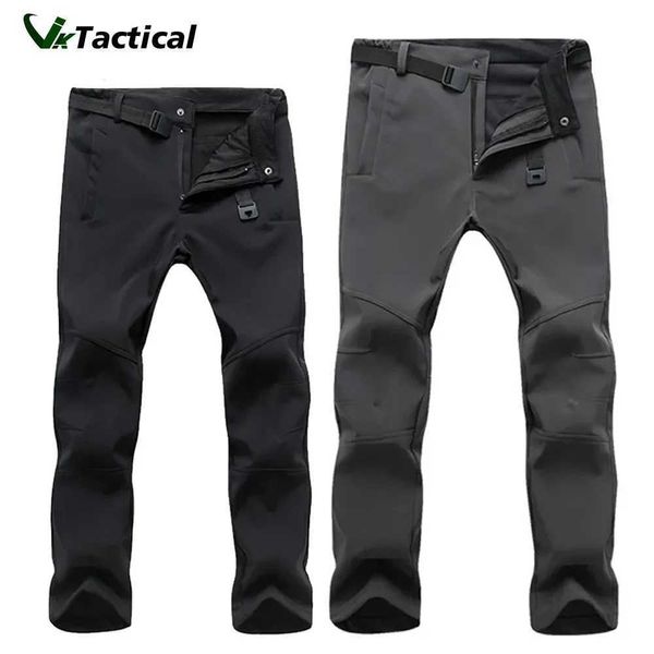 Calças masculinas New Winter Soft Shell Palnta de caminhada quente calças táticas calças de carga de lã para homens