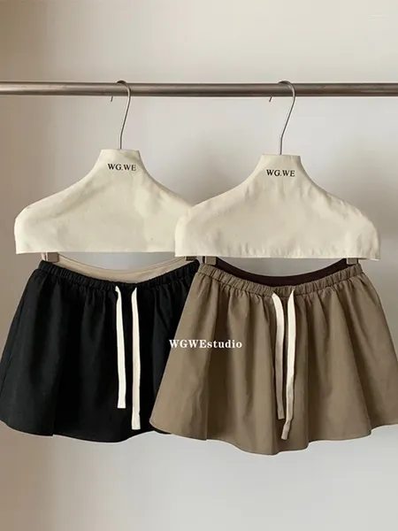 Saias americanas Retro A-line Salia Gyaru Bottoms sólido Cintura elástica Mini laço up