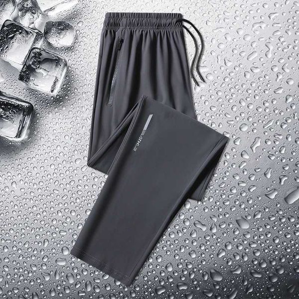 Calças masculinas 2024 homens solteiros calças casuais retas de seda de seda de seda rápida calça de bolso com zíper de tamanho grande calças de corrida 8xll2403