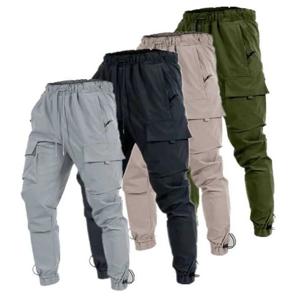 Calças masculinas novas calças esportivas casuais européias e americanas com vários bolsos na cintura e trabalho de trabalho de grandes dimensõesl2404