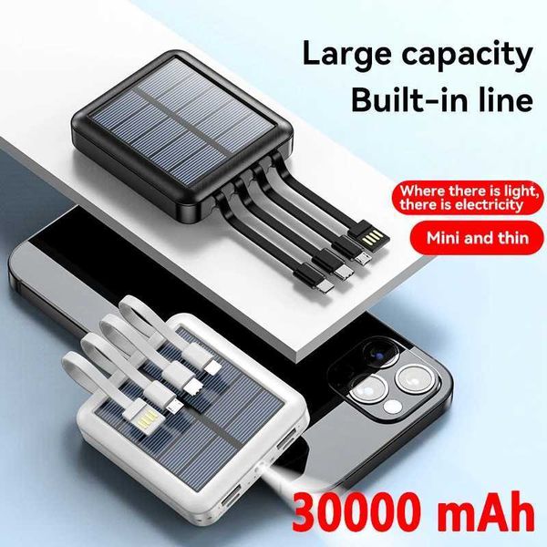 Bancos de energia do telefone celular 4in1 Power Bank Energia solar 30000mAh Catilhamento de grande capacidade Mini Power Bank equipado com quatro fios adequados para Samsung iPhone e Xiaomi J