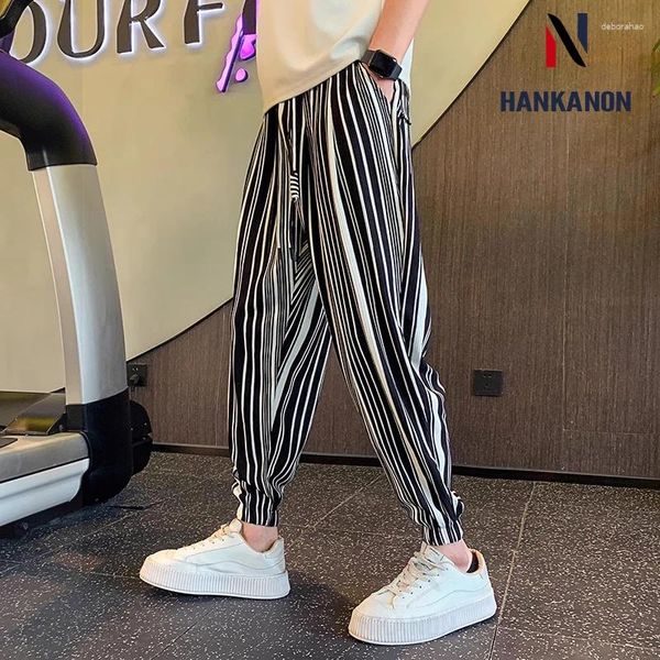 Pantaloni da uomo Summer Ice Silk Silk sottile Lunghezza in bianco e nero Block Slim Slim comodo pantaloni da uomo elastico.