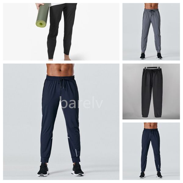 Pantaloni lunghi designer uomini sportivi in ​​allineate yoga tasche da ginnastica per esterni in forma slimpants pantalone pantaloni da jogger maschi