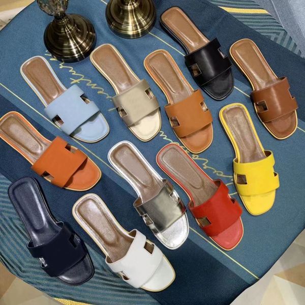 Scarpe da firma delle pantofole da spiaggia scarponi piatti Slipper Slide Lazy Fashion Carunone Flops Testa Flop in pelle Scarpe da donna Hotel Bath Ladies Sandals Sexy Sandals Taglia 34-42 con scatola