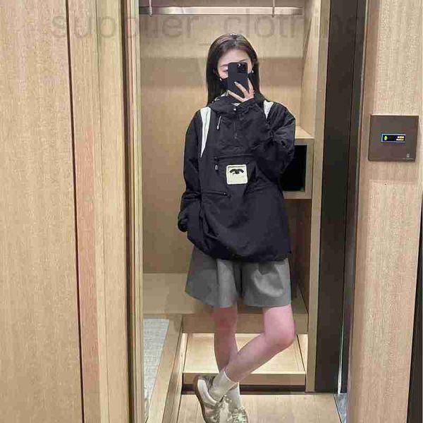 Designer di giacche da donna 23 Nuovo Blocco a colori con cappuccio con cappuccio con tessuto di tecnologia antivento W667
