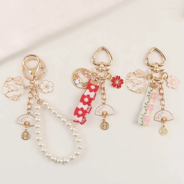 Keychains Schlüsselbund Klappventilator Kirschblütenschlüssel Ringbeutel Ornamente Pendle Charm Ribbon Imitation Perle süße Anhänger Mädchen