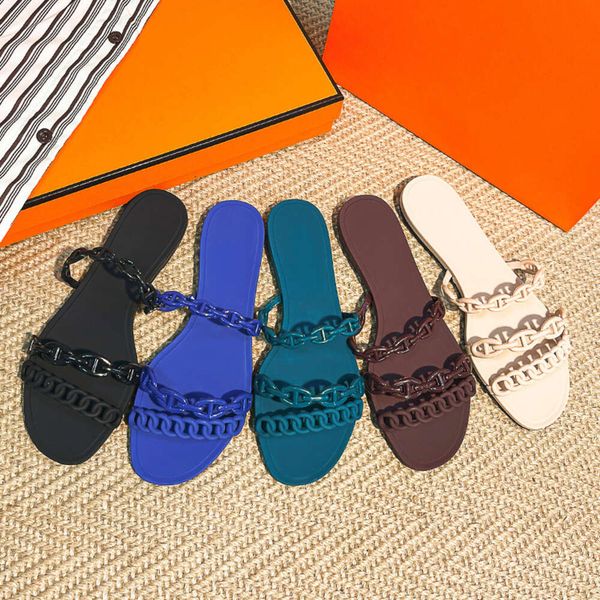 Designer Sandalen H Kanalies Heels Sommer Internet Berühmtheit drei Gürtelkette Schwein Nase Strand flacher Boden H Kühle Pantoffeln Frauen PVC Plastik -Gelee -Schuhe