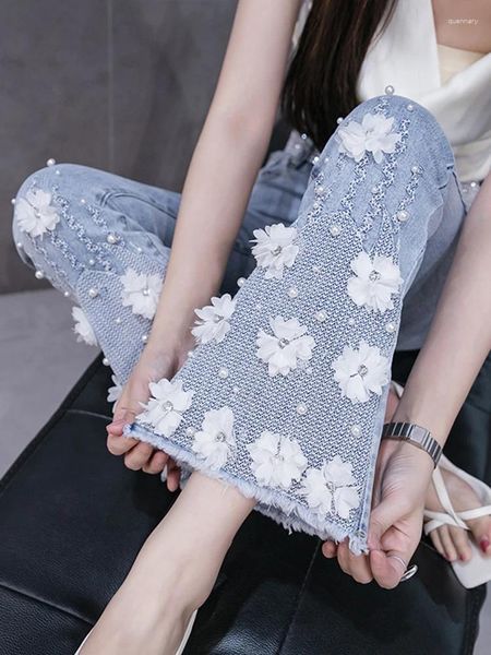 Jeans femminile coreano di moda pesante industria ricamata Micro flare femminile Trumpettazione della caviglia pantaloni di denim pantaloni eleganti pantaloni perline 2024