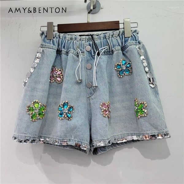 Shorts femininos Estação européia 2024 Verão pesado artesanal flor strass jeans da rua elástica cintura solta calças de perna larga larga