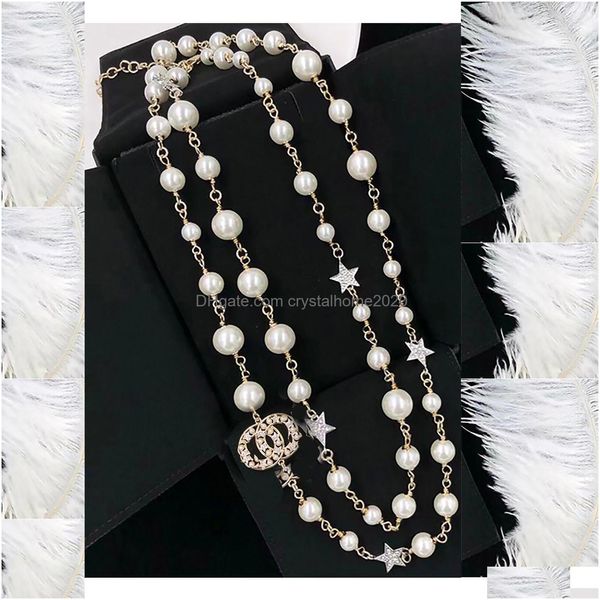 Collane con pendente 2022 Collana di moda Collane con pendente lungo Fili di stile classico Stringhe Elegante catena di perle Lettera Doppio strato S Dhviz