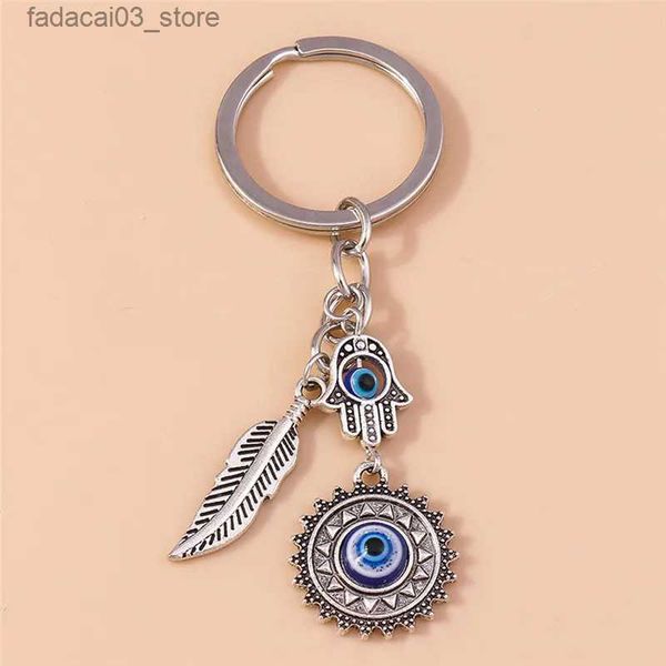 Chaveiros Lanyards 1 Pc Bohemia Evil Eye Hamsa Chaveiro de Mão para Mulheres Homens Blue Eye Sun Pena Chaveiro Saco Pingente Chaveiro Chave Anéis Atacado Q240201