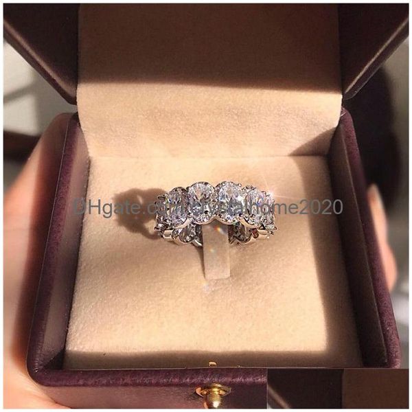 Обручальные кольца Потрясающие лимитированные кольца Eternity Band Promise Ring Sterling Sier 11 шт. Обручальные кольца с овальным бриллиантом Cz для Drop Deliv Dhrpz