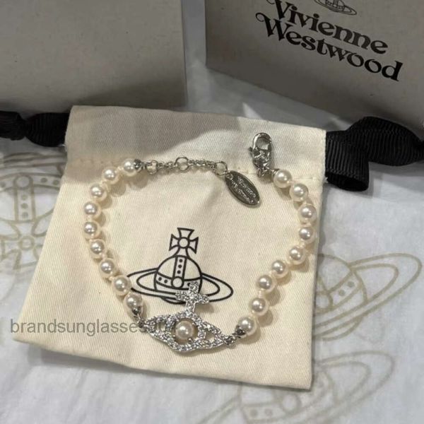 Designer de jóias de luxo VivienenWestwoods Satellite Viviane Westwood 23 Western Empress Dowager Hollow Saturn Pearl Bracelet Womens French Classic Planet Cross