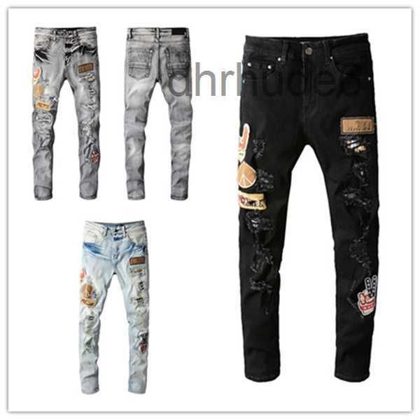 Designer Inverno Uomo Jeans Design di qualità Foro Colore Toppa Impiombato Strappato High Street Gamba sottile Motociclista Denim distrutto Pantaloni Hip Hop Us Taglia EU W28-w40 20PN