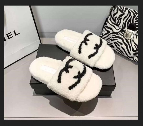 Pantofole Pelle di lana Pelle di pecora Sottopiede Presentazioni aziende produttrici giochi Sandali Pantofola piatta Designer Donna Morbido inverno Lusso Peluche Pelliccia Oran Suola in gomma 2C