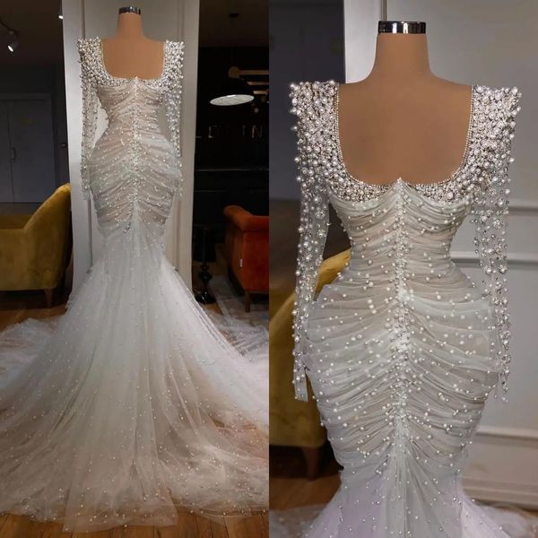 Abiti da sposa di lusso Abito da sposa a sirena con perline di perle Vedere attraverso abiti da sposa su misura a maniche lunghe Vestido de novia