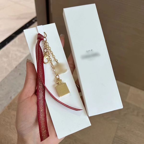 Designer de natal limitado ouro perfume pingente flor hairpin metal presilhas fita chaveiro diy pingente ornamento pingente