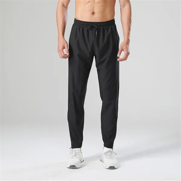 Pantaloni da uomo estivi tinta unita elastico in vita allacciati con cerniera compressione yoga per donna pantaloni sportivi da uomo termici