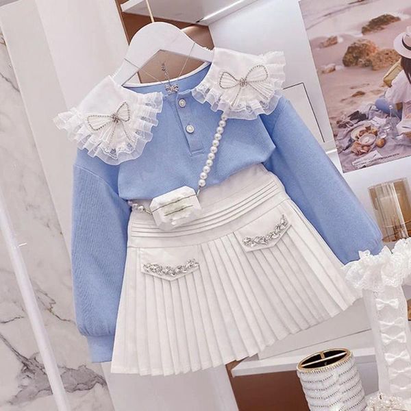 Set di abbigliamento Set di moda dolce primavera per ragazza 2024 Colletto per bambola con fiocco azzurro cielo Polsini con filo Top Gonna a pieghe bianca in due pezzi