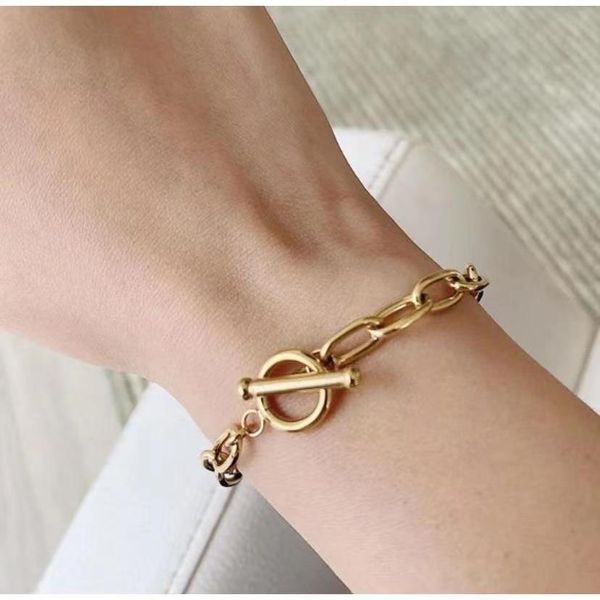 Bracciale in oro classico alla moda pigra francese Bracciale con clip di carta Ghiera OT Gioielli in acciaio al titanio placcato oro Abbinamento estivo