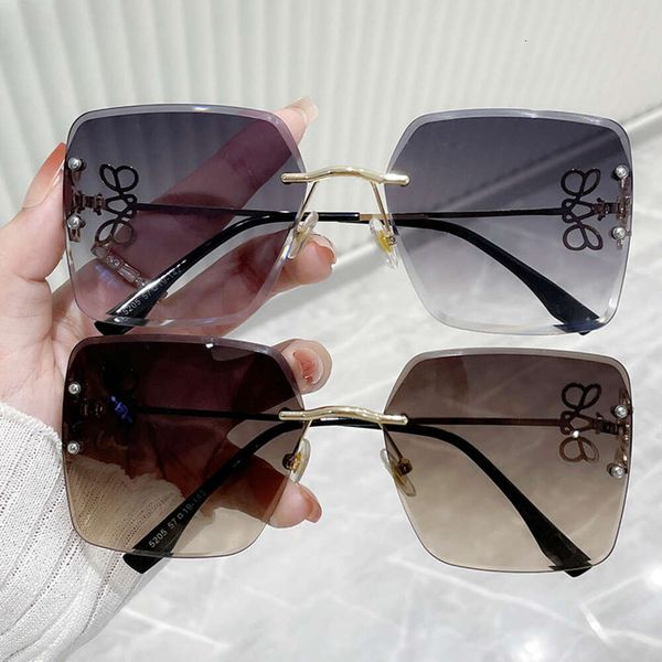 Novo estilo de óculos de sol de armação grande com bordas cortadas sem moldura, óculos de sol para fotos de rua, decoração ao ar livre, óculos de uso