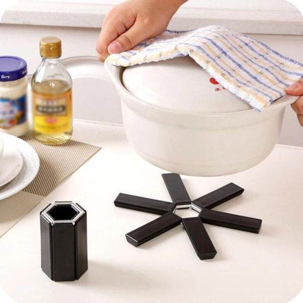 Tovagliette 1 Pz Stuoia per piatti Tovaglietta per piatti Pieghevole Isolamento termico Pentole e padelle ad alta temperatura Gadget da cucina Goccia