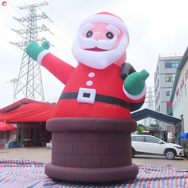 Attività all'aperto Babbo Natale gonfiabile gigante da 40 piedi sul modello pubblicitario natalizio del camino con luce a led per la decorazione del cortile