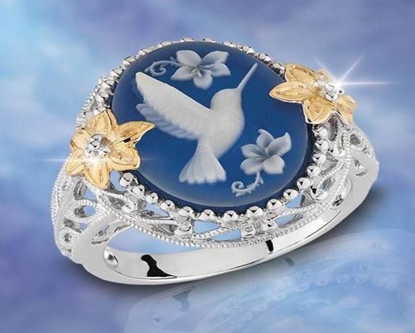 Nuove donne039s Gioielli Moda Argento Creativo Blu Colomba della pace Anello Yiwu Piccoli accessori Intero3018829