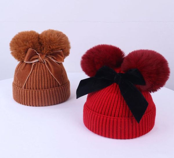 9 Renk Bebek Pom Beanie Cap Toddler Çocuk Bebek Kız Bebek Kış Sıcak Tığ Örgütlü Şapka Çift Kürk Top Yay Şapkaları Aksesuarları M3126693508