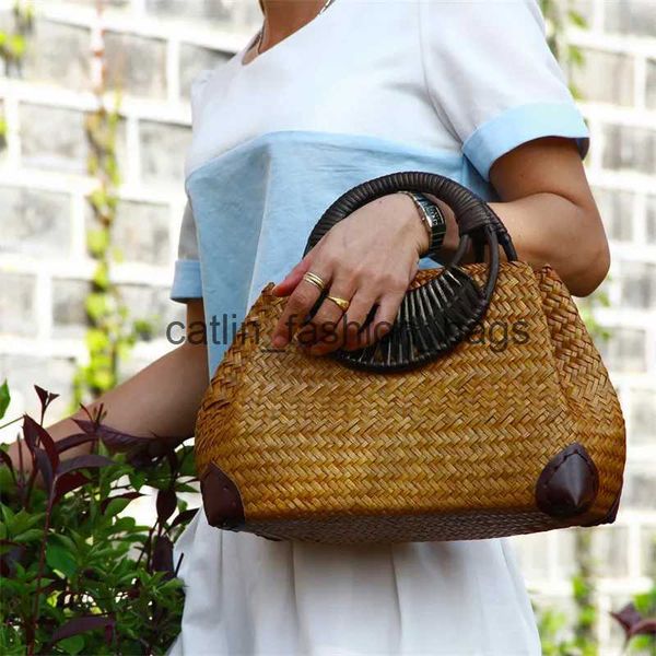Totes Borsa a mano da donna di moda f versione tailandese della borsa in paglia retrò vaso da viaggio con manico in legno di bambù da spiaggia H24217