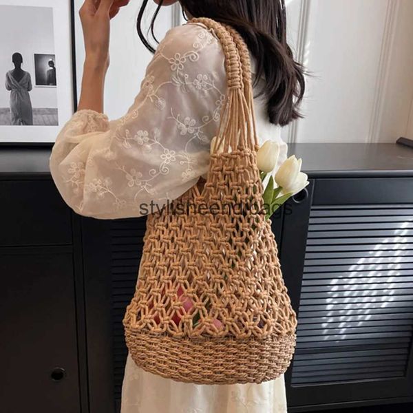 Bolsas de ombro 2023 verão praia saco de palha design de luxo feminino trançado oco ráfia grande capacidade casual tote bolsah24217