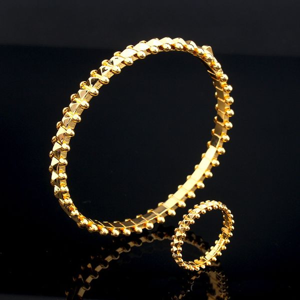 Nuova piramide di diamanti Liuding Bracciale con testa di proiettile Bracciale rotante Collana in oro Orecchini in argento Anello Fibbia Bracciale Punk Produttore di gioielli Vendita al dettaglio all'ingrosso