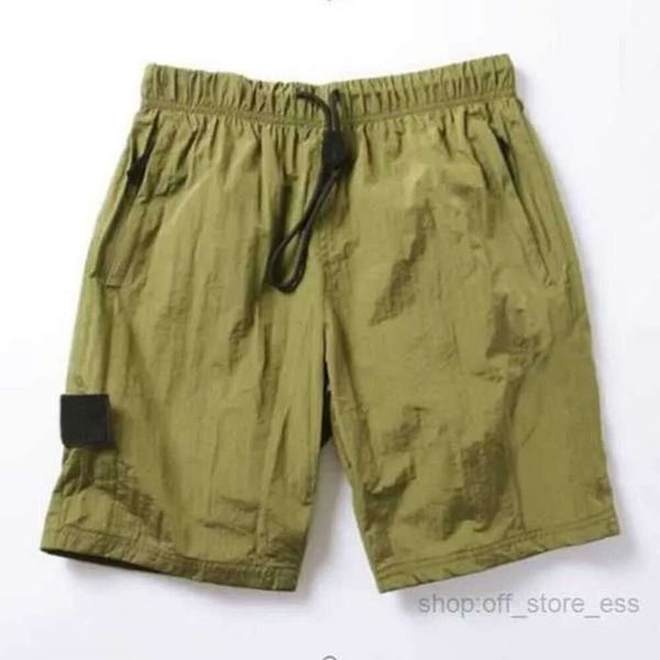 Praia 2024 Shorts de verão masculino calças curtas moda correndo solto processo de lavagem de secagem rápida de tecido puro na moda casual hip-hop ins pedras ilha 8888yyy