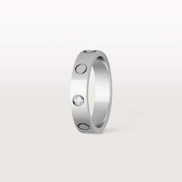 Дизайнерское кольцо титанового стального сплава Серебряное кольцо любви Мужчина и женское розовое модельером роскошная пара обещание никогда не исчезает не аллергические обручальные кольца 293
