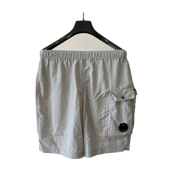 Topstoney 2024 nova marca de moda shorts botão decoração designer masculino metal náilon shorts moda high street shorts esportivos de secagem rápida maiô calças de praia masculinas