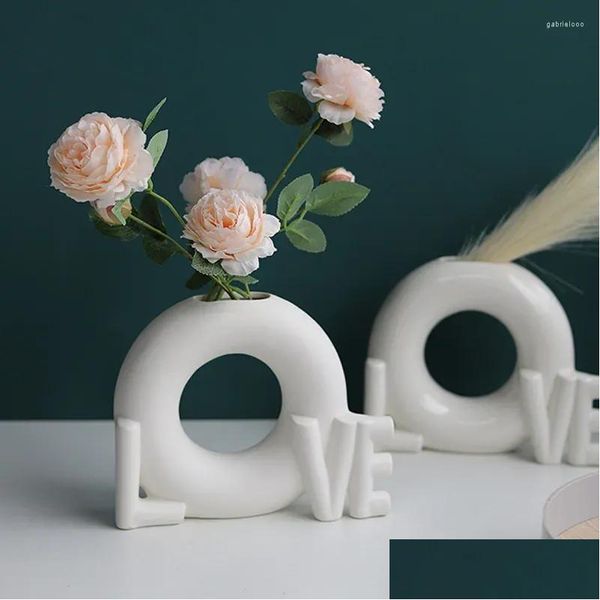 Vasi Stile nordico Forma di carattere avanzata Decorazione domestica in ceramica Opera d'arte desktop Disposizione dei fiori Vaso Articoli unici e nuovi Drop De Dhdsa
