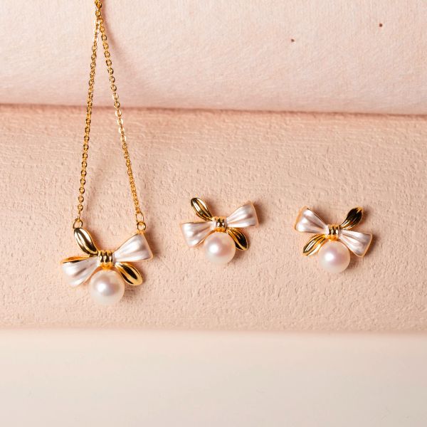 Imposta nuova perla d'acqua dolce naturale moda semplice fiocco design ciondolo gioielli in oro 14 carati per collana da donna set di gioielli di perle