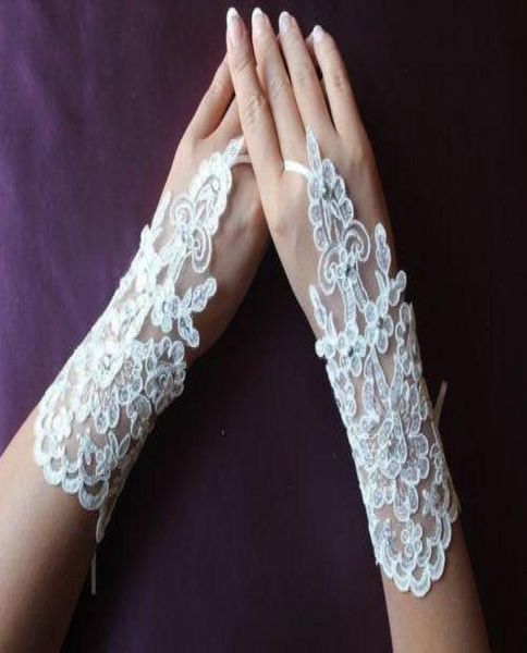 Weiße oder elfenbeinfarbene, brandneue, fingerlose, handgelenklange Handschuhe aus Tüll mit Applikationen, kurze Braut- und Hochzeitshandschuhe1332230