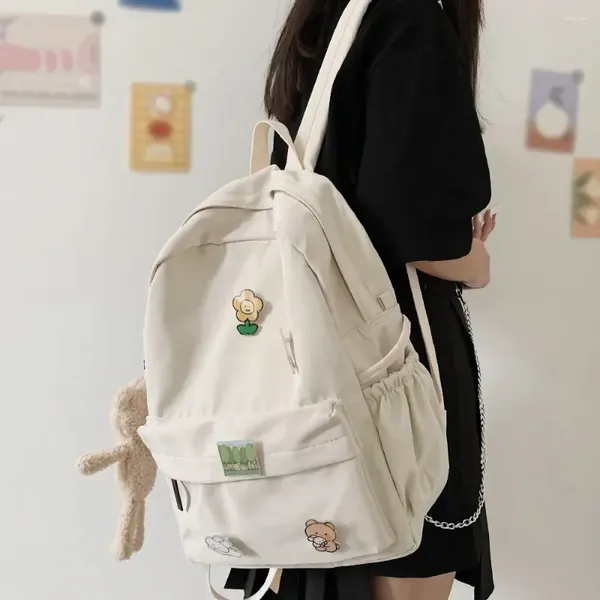 Borse da scuola da donna in nylon carino zaino con orso ragazza borsa distintivo bambola tendenza moda