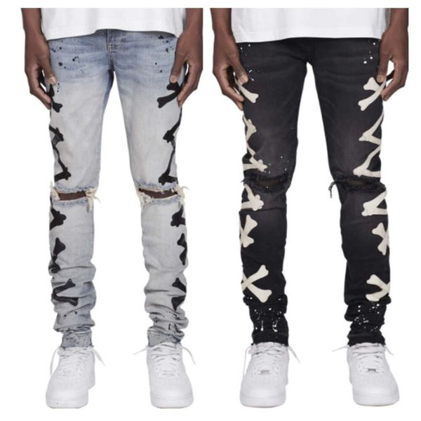 Jeans elastici stampati con foro strappato da uomo di alta qualità 2024 con tendenza alla stampa di ossa nuovo stile