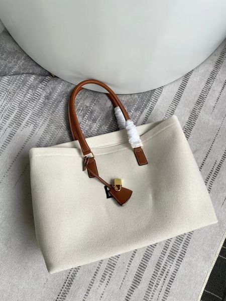 Borsa in pelle di vitello in tela stampata, borsa per laptop alla moda, tasca interna con cerniera, versatile borsa per la spesa per viaggi a breve distanza Borsa di design di lusso designerbags0815