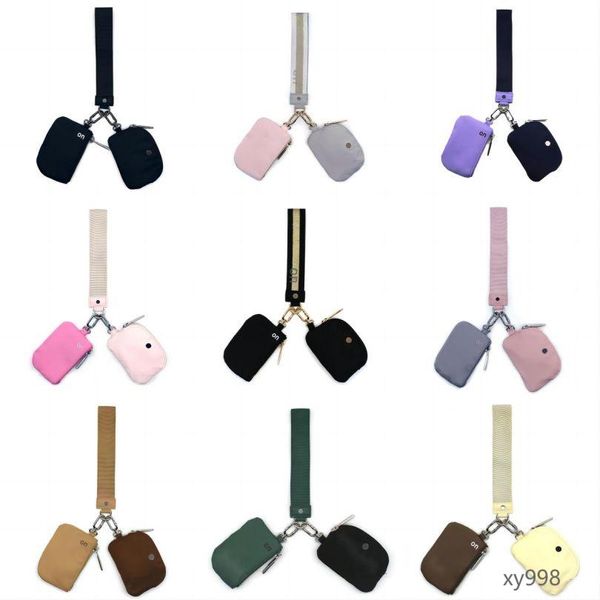 Catene a chiave da polso da polso a frizione clutch porta portafoglio portafoglio da yoga ginnastica borsetta designer con cerniera staccabile avvolgimento intorno al portafoglio di guardia del polso portafoglio portatile tascabile rosa tasca