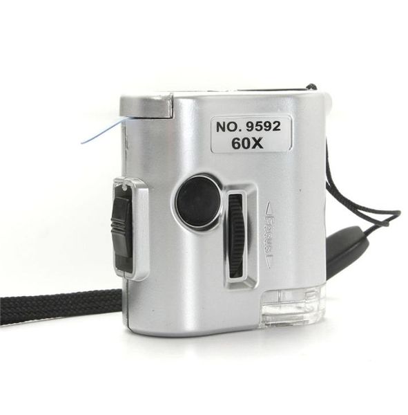 Mini 60X microscopio illuminato lente d'ingrandimento in vetro per gioielliere con strumento di riparazione orologio a luce UV LED6390389