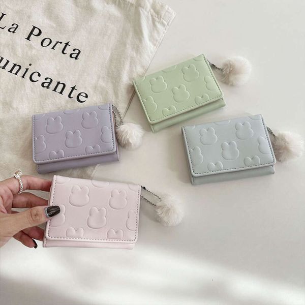 Mulheres curto bonito carteira espuma impressão coelho moeda bolsa peludo bola pingente três dobras carteira titular do cartão menina dos desenhos animados embreagem