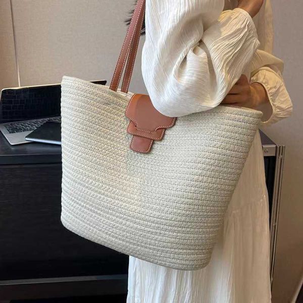 Nuova borsa intrecciata versatile con borsa intrecciata in paglia di filo di cotone di grande capacità, borsa per le vacanze al mare, borsa da donna minimalista 240215