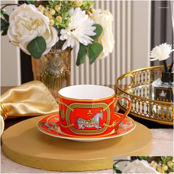 Tazze Piattini Set di tazze da caffè di lusso Euro Royal Court Bone China Tazze con manico dorato Set da tè pomeridiano con confezione regalo con cucchiaio Dro Dhisq