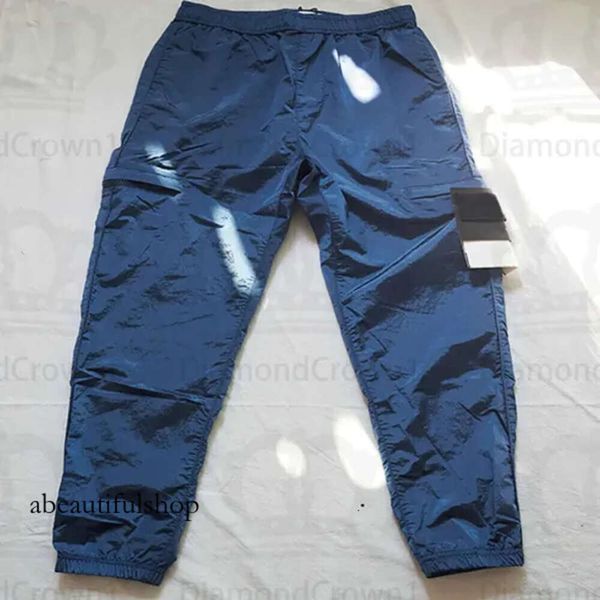 Designer con cappuccio in pietra Pantaloni Cp Company Pantaloni cargo Tasca in nylon metallico Distintivo ricamato Pantaloni con cappuccio casual Stones Island Pantaloni sottili riflettenti dell'isola 287