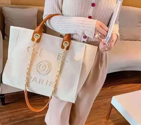 2024 NOVO Luxo Clássico Moda Praia Sacos Tote Label Pearl Evening Bag Portátil Grande Capacidade Feminino Designer Bolsa de Lona Marca Mulheres Bolsas Senhoras Mochila