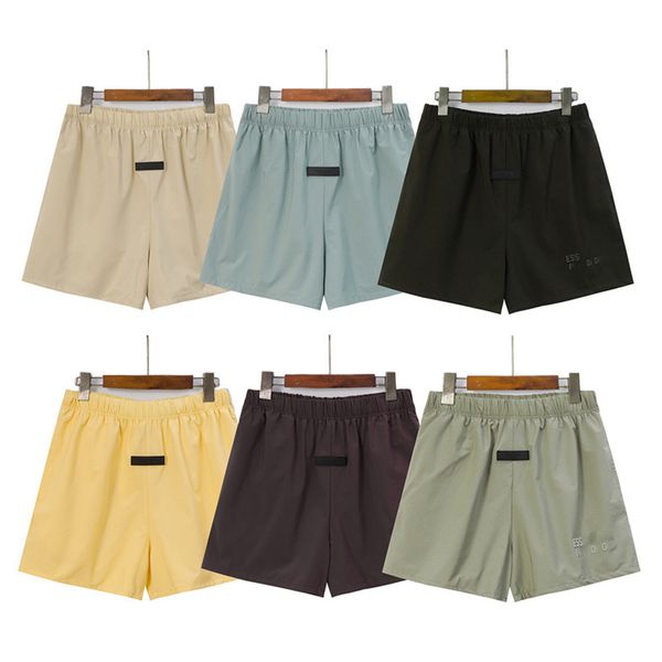 Pantaloncini da uomo Pantaloni firmati Estate Tinta unita Americano Trendy Marchio Allentato Casual Asciugatura rapida Cintura stretta allentata Pantaloni sportivi Lettera Stampa Decorazione Pantaloni da spiaggia